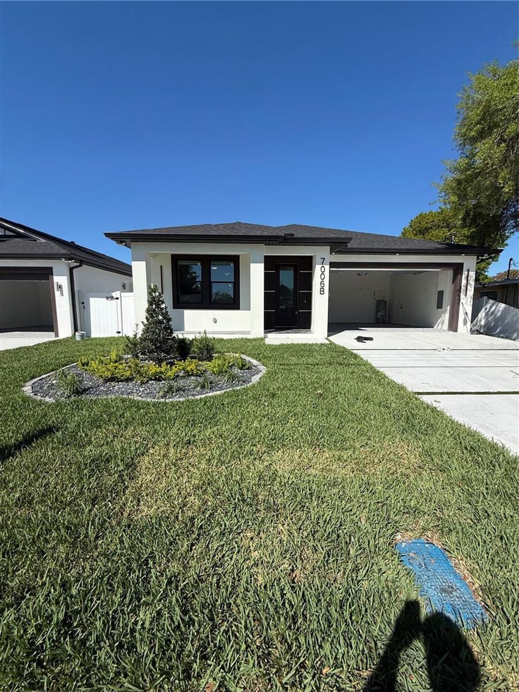 Photo of 7006 Thatcher Ave #305, Tampa, FL 33614 (MLS # TB8468412)