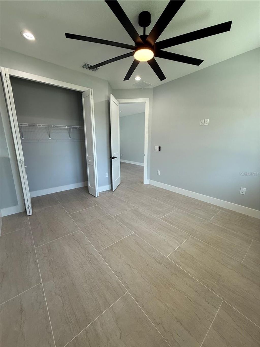 Photo of 7006 Thatcher Ave #305, Tampa, FL 33614 (MLS # TB8468412)