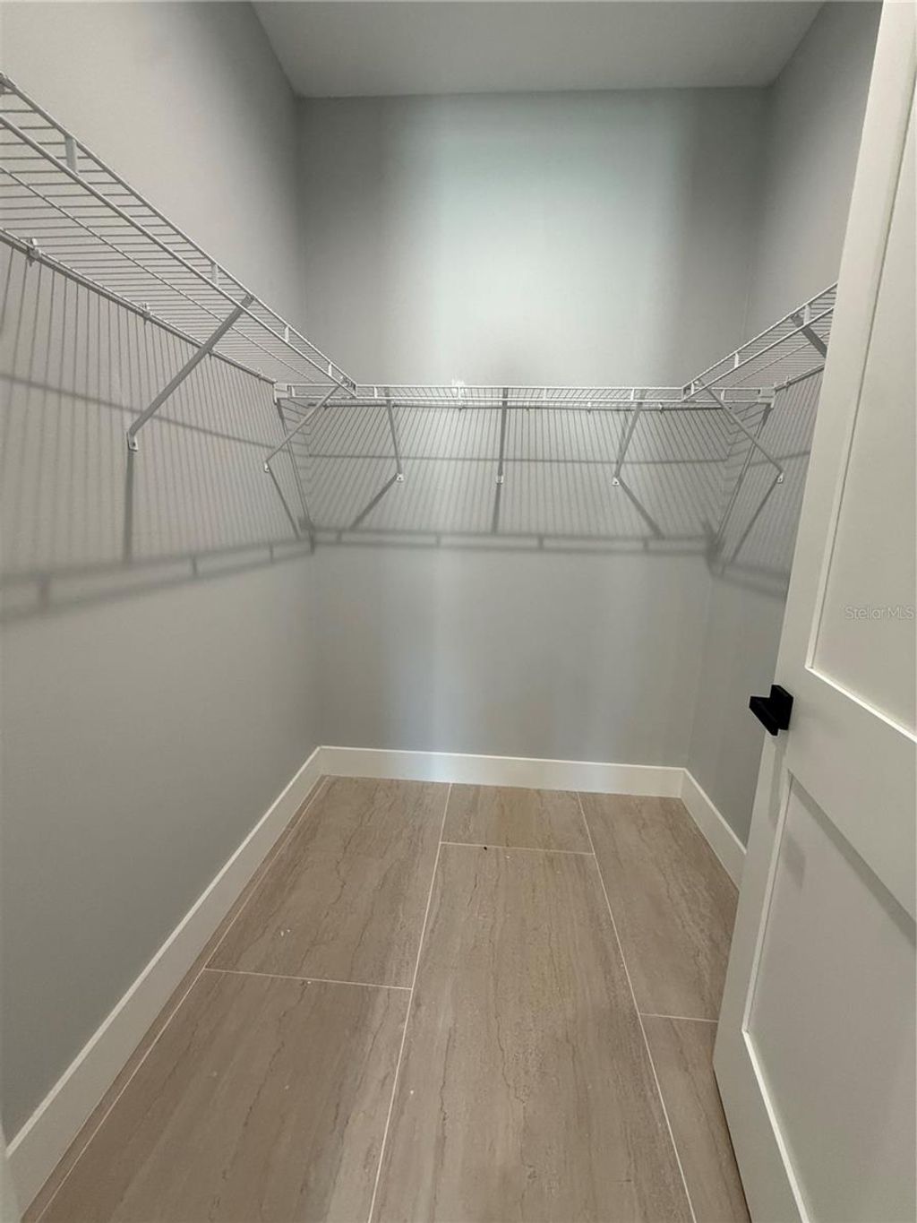 Photo of 7006 Thatcher Ave #305, Tampa, FL 33614 (MLS # TB8468412)