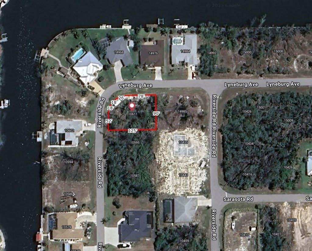 Photo of 10611 Riverside Road, Port Charlotte, FL 33981 (MLS # A4670652)