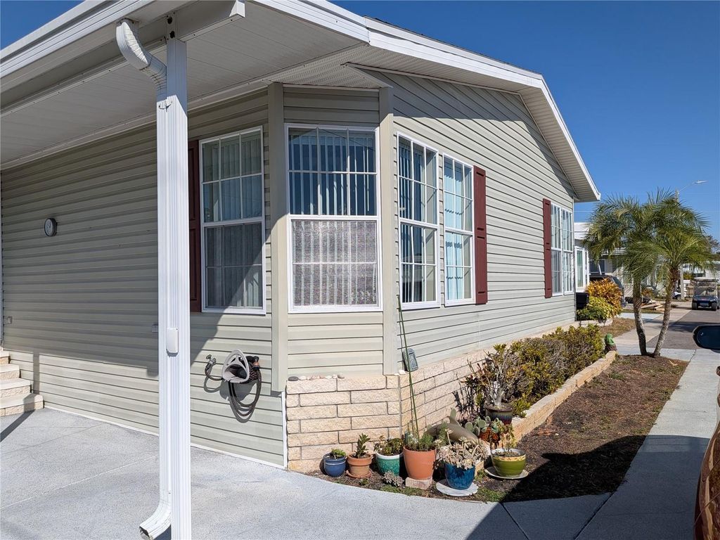 Photo of 34709 Lake Drive N, Pinellas Park, FL 33781 (MLS # TB8474823)