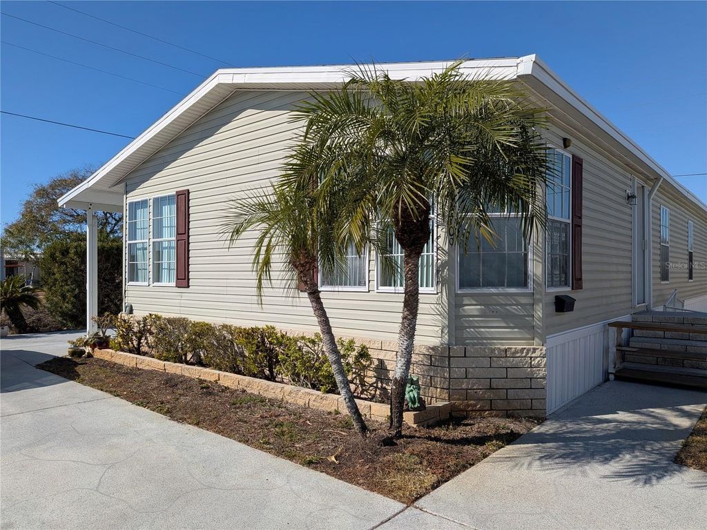 Photo of 34709 Lake Drive N, Pinellas Park, FL 33781 (MLS # TB8474823)