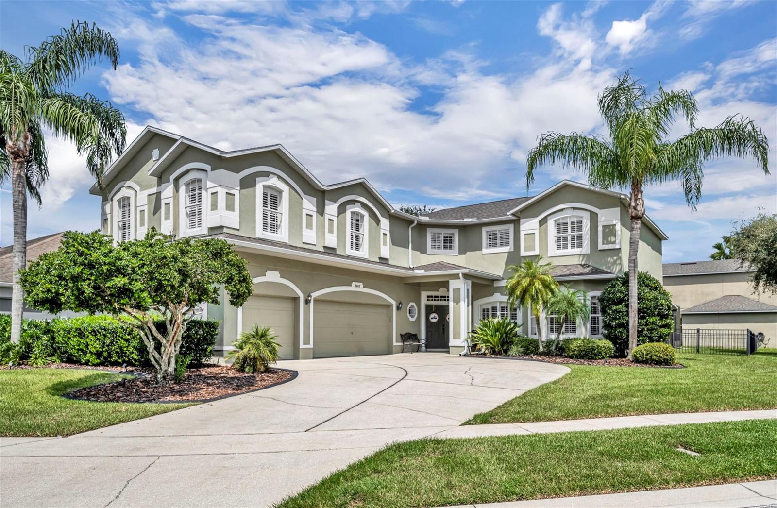 Beautifully situated within the gated North Shore at Lake Hart community in Lake Nona, this spacious home offers refined living with incredible versatility. Designed with 4 bedrooms plus a private fifth bedroom suite complete with its own living room and full kitchen, the layout is ideal for in-laws, a nanny, guests, or extended family. The entryway opens to formal living and dining areas filled with natural light, highlighted by tile and wood-look flooring and plantation shutters throughout. A built-in chair lift makes the second floor easily accessible, while the first-floor bedroom serves perfectly as a guest room or home office and includes a convenient Murphy bed. Upstairs, the owner’s retreat is expansive, offering a generous sitting area and a newly remodeled shower in the en suite bath, with additional bedrooms providing plenty of comfort and flexibility. The highlight of the home is the self-contained suite with its own kitchen and living area, offering unmatched functionality for multi-generational living. Outdoors, the screened pool and patio create a private retreat for year-round enjoyment. North Shore at Lake Hart is a gated, master-planned community with resort-style amenities including a recreation center, fitness center, community pool, tennis and basketball courts, a baseball and softball field, playgrounds, scenic walking trails, and a boat dock on Lake Hart. At the heart of the community is the public 18-hole North Shore Golf Club, featuring a Carolina-style wooded front nine and a Florida-links-style back nine, along with a clubhouse, dining, and practice facilities. The neighborhood is conveniently located near 417 and 528, top-rated schools, Medical City, Orlando International Airport, Lake Nona Town Center, shopping, and dining, offering a perfect combination of comfort, flexibility, and an amenity-rich lifestyle. • ROOF 2024 • Please request an Updates List on this beautiful property and schedule your private showing today!