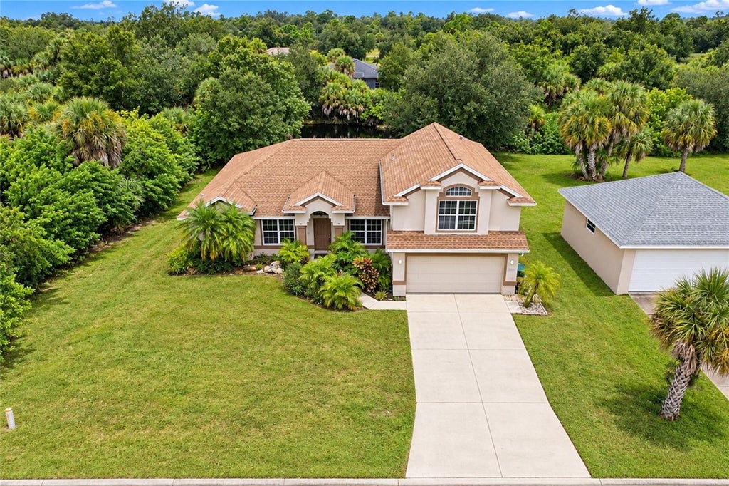 Photo of 447 Ravenswood Boulevard, Port Charlotte, FL 33954 (MLS # C7532179)