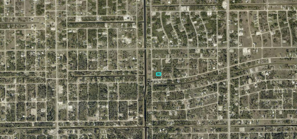 Photo of 820 Bajo Avenue S, Lehigh Acres, FL 33974 (MLS # A4680345)