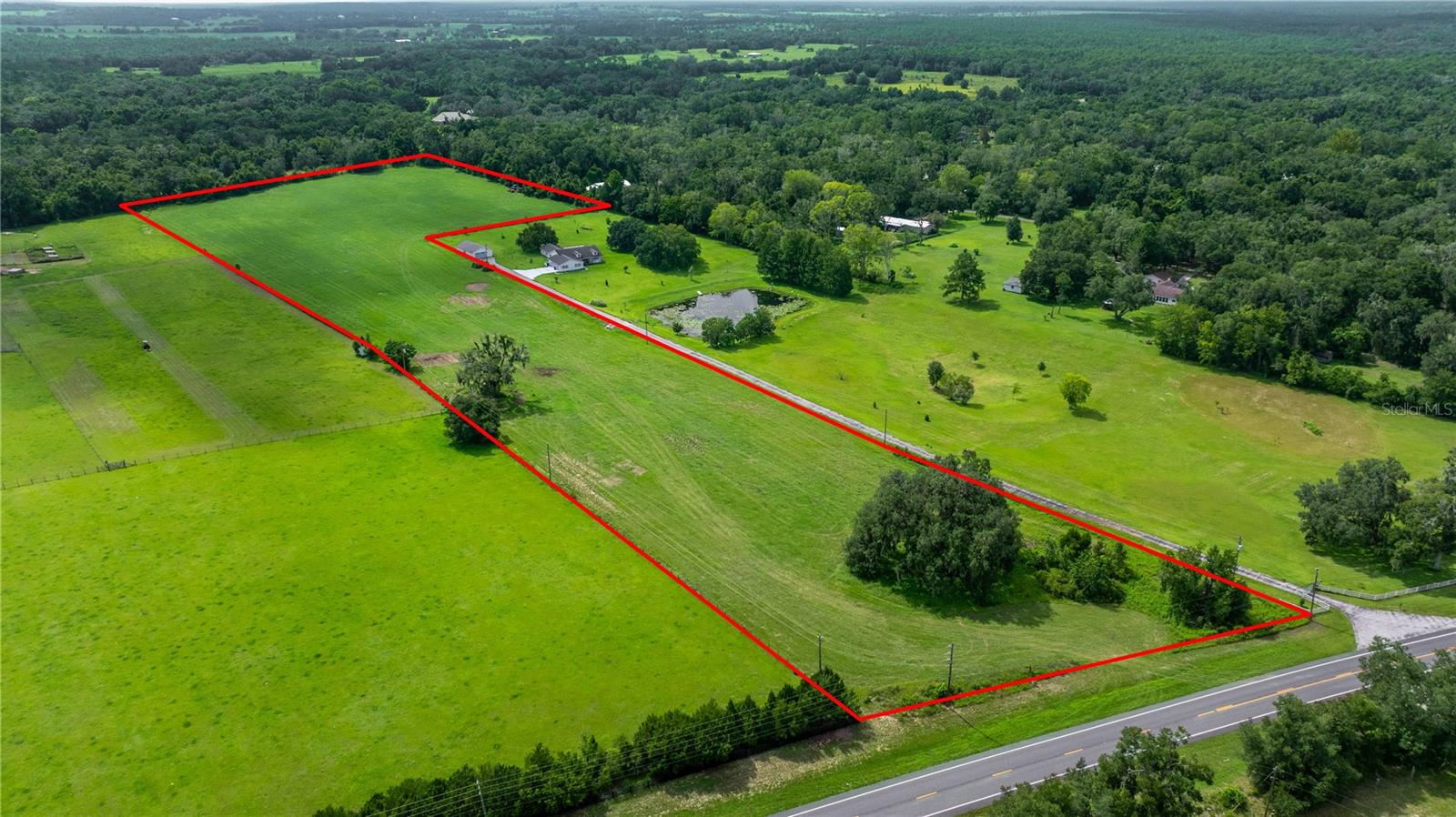 Build Your Dream Gentleman’s Farm – 13+ Acres Cleared and Ready! Discover the perfect canvas for your rural vision with this 13-acre tract of cleared land, ready to build your own farm. Whether you’re looking to construct a custom home, place a mobile home, or simply invest in wide-open space, this versatile property offers endless possibilities. Located in a peaceful, country setting, the land is already cleared and maintained under a current hay lease—helping to keep property taxes impressively low while preserving the pastoral beauty. The lease can be continued or ended at your discretion, offering flexibility for future plans. With mobile homes permitted, you have the freedom to move in quickly or develop at your own pace. There’s plenty of room for barns, livestock, gardens, or recreation. This is an ideal opportunity for hobby farmers, homesteaders, or anyone seeking a simpler lifestyle with room to grow.