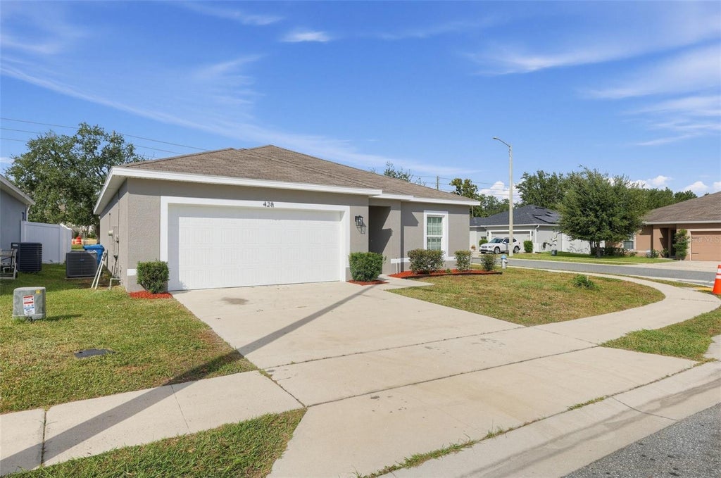 Photo of 428 Rooks Loop, Haines City, FL 33844 (MLS # TB8562550)