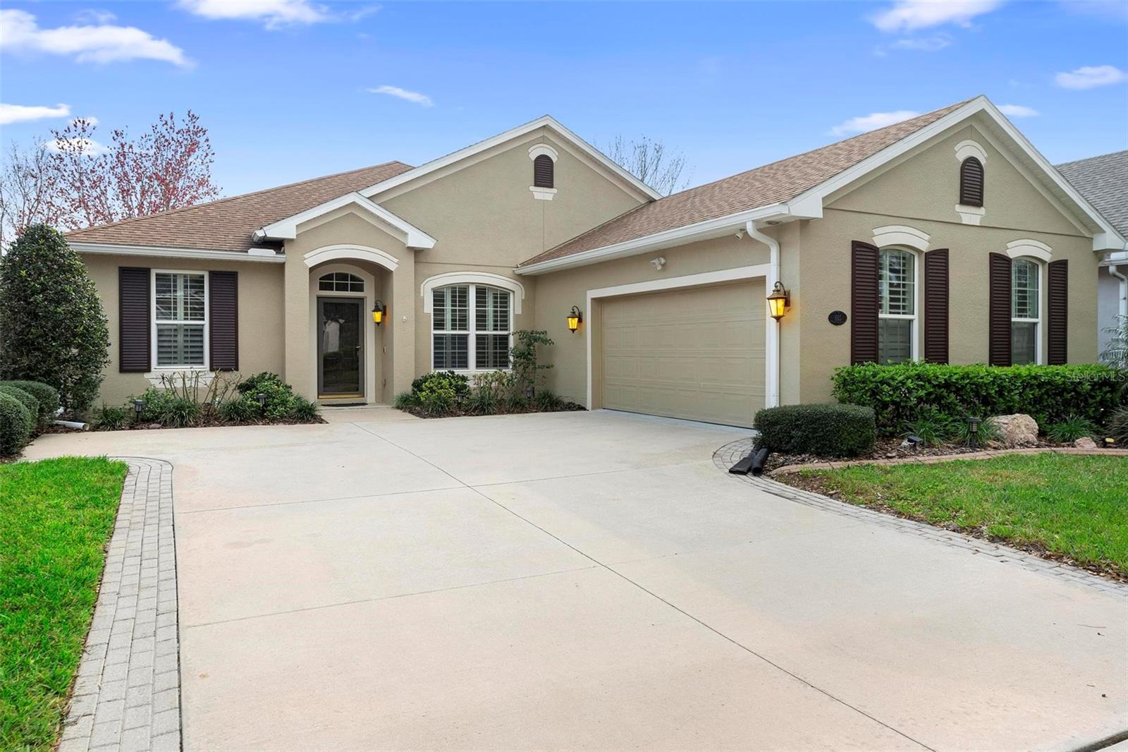 Stunning Duke Model in Victoria Gardens – 55+ Active Adult Community! Welcome to 1115 Heron Point Way, a beautifully maintained 3-bedroom, 2-bath home with a formal dining room and office/den/flex space, located in the highly sought-after guard-gated Victoria Gardens community. This spacious Duke Model by St Joe offers an exceptional layout with solid flooring throughout, including brand-new wood look flooring in the dining room and office. This home features an open floor plan, with the kitchen overlooking the dining and living room, creating the perfect space for entertaining. The kitchen, updated in 2019, boasts quartz countertops, solid wood cabinets, a stylish backsplash, and newer stainless-steel appliances, including the refrigerator and gas stove. New windows (2016) and plantation shutters (2023) add to the home’s charm and energy efficiency. Step out back to your re-screened lanai overlooking lush landscaping in your fully fenced backyard offering privacy and relaxation. A spacious owner’s suite boasts dual closets and an en-suite bathroom complete with double sinks, a private toilet area, and a separate shower and tub. An oversized 2.5-car garage (26’ x 21’ / 546 sq. ft.) provides ample space for a golf cart and extra storage and includes a 2nd refrigerator and shelving. Recent updates and features include: roof (2020), gas HVAC (2019), gas water heater (2020), washer/dryer(2020), whole home gutters and new attic stairs. The exterior has been sealed and painted with high-quality Sherwin Williams Duration paint, ensuring long-lasting curb appeal. This natural gas community offers energy efficiency and convenience. HOA dues include Spectrum internet/cable, lawn care including mowing, trimming, lawn and weed spraying, sprinkler maintenance, and reclaimed water for sprinklers. Enjoy resort-style living with access to a private clubhouse featuring a restaurant, bar, fitness center, card rooms, craft room, and pool tables. Additional community amenities include a resort-style pool, tennis and pickleball courts, bocce ball, a ballroom with a dance floor, workout classes and more. Don’t miss this opportunity to own a this well maintained home in one of the area's most desirable 55+ active adult communities. Seller Offering $5,000 credit towards buyers closing costs! Schedule your showing today!