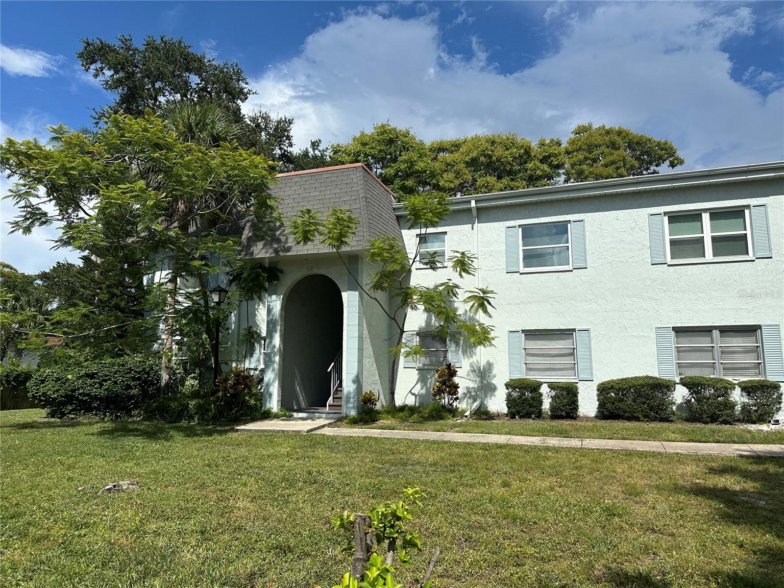 Welcome home to this beautifully updated 2-bedroom, 1-bath condo located in the highly sought-after Tradewinds community in Clearwater, Florida. This bright and inviting home features 968 square feet of living space, highlighted by luxury vinyl flooring throughout and ceramic tile in the modernized kitchen. Enjoy preparing meals in your updated kitchen featuring stylish granite countertops, stainless steel appliances—including a refrigerator, stove, microwave, and dishwasher—and elegant cabinetry with ample storage. Dual-pane insulated windows and sliding doors provide energy efficiency and comfort while enhancing the peaceful indoor ambiance. Step outside onto your screened back patio to unwind or entertain, and benefit from extra convenience with an attached storage room. Residents of Tradewinds enjoy fantastic amenities including a community pool, clubhouse with a party room, fireplace, kitchen area, ping-pong, pool tables, two community laundry facilities, outdoor grilling area, and close proximity to biking and walking trails. Ideally located just minutes from charming downtown Safety Harbor, renowned Clearwater beaches, shopping, restaurants, and entertainment, this move-in-ready condo is perfect for those seeking comfort, convenience, and the relaxed Florida lifestyle. Schedule your private showing today!
