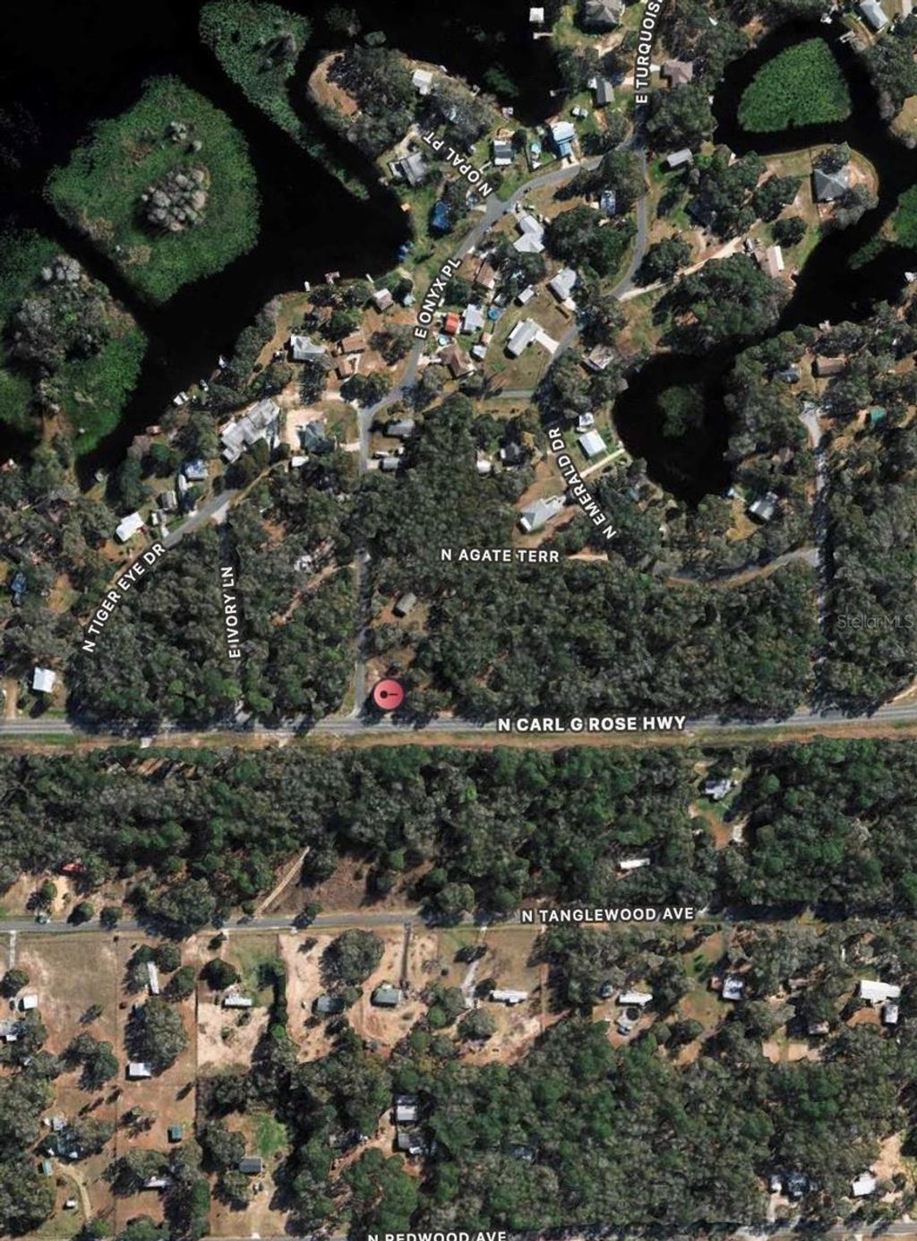 Photo of 5119 N Carl G Rose Highway, Hernando, FL 34442 (MLS # OM704565)