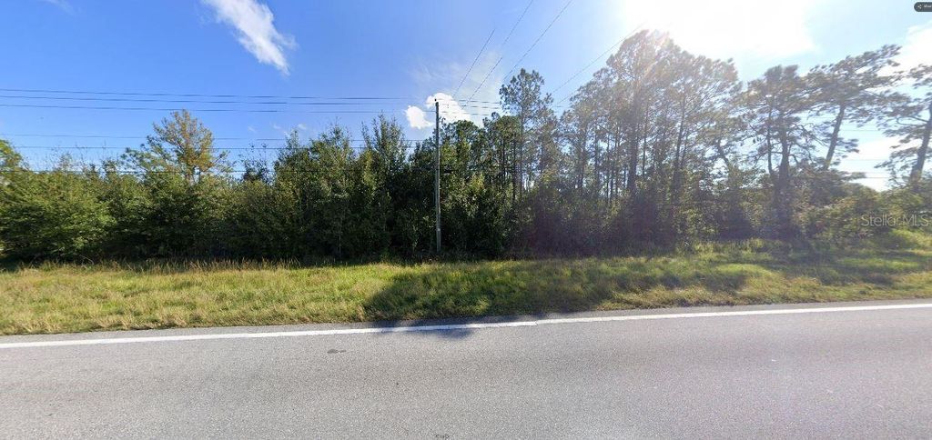 Photo of Old Grade Rd, Polk City, FL 33868 (MLS # O6272135)