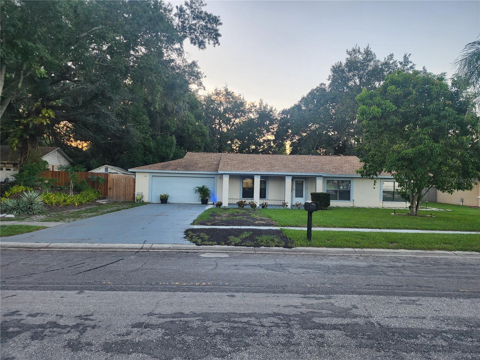 LOCATION-LOCATION-LOCATION- More pictures coming soon, Welcome to this charming pool single family home nestled in the serene neighborhood of Woodbriar west. This spacious property offers comfort and tranquility for the discerning homeowner. As you step through the front door, you're greeted by the inviting ambiance of a well maintained home. Spread a cross 2078 square feet, this residence features four bedrooms and two and half baths, providing ample space for both relaxation and entertaining, The interior is adorned with sleek porcelain title floorings throughout the main living areas, offering durability and elegance. vinyl floors in select rooms add a touch of warmth and comfort. A highlight of this home is its screened pool with huge back yard perfect for out door activities and al fresco dining, It's located just a minute from Tampa airport and veterans Highway, and the best beaches of Florida , clearwater and St peter. Roof was replaced in 2022. No flood zone. Welcome Home!