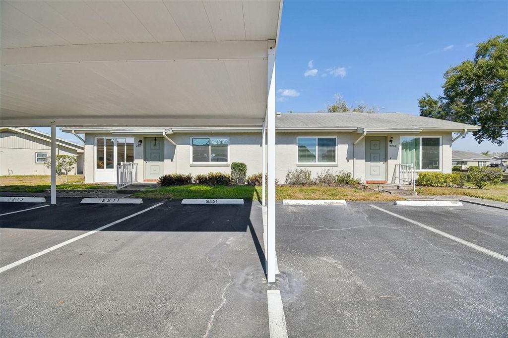 Photo of 2211 Grenadier Drive #140, Sun City Center, FL 33573 (MLS # TB8481348)