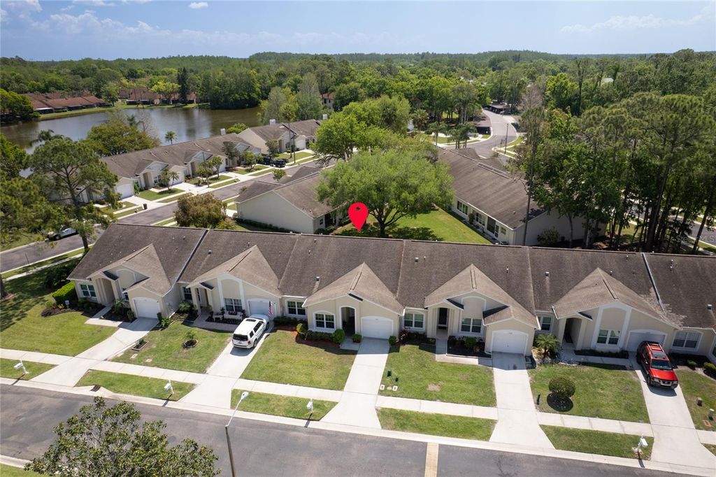 Photo of 3511 Tealwood Circle, Palm Harbor, FL 34685 (MLS # TB8497190)