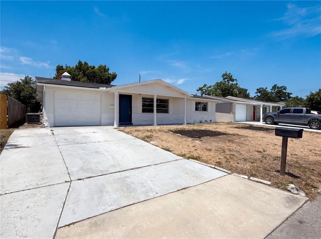 Photo of 3523 Berkshire Street, New Port Richey, FL 34652 (MLS # O6404687)