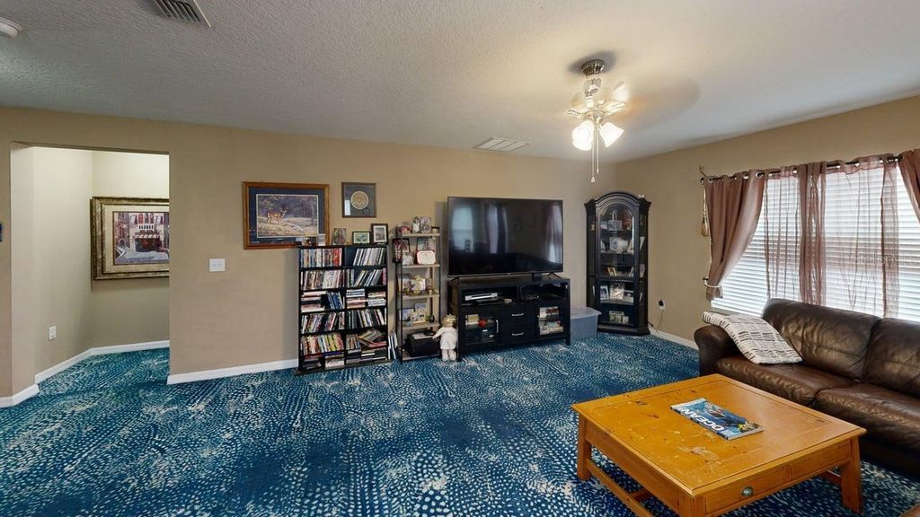Photo of 1758 Dunedin Drive, Tavares, FL 32778 (MLS # O6367913)