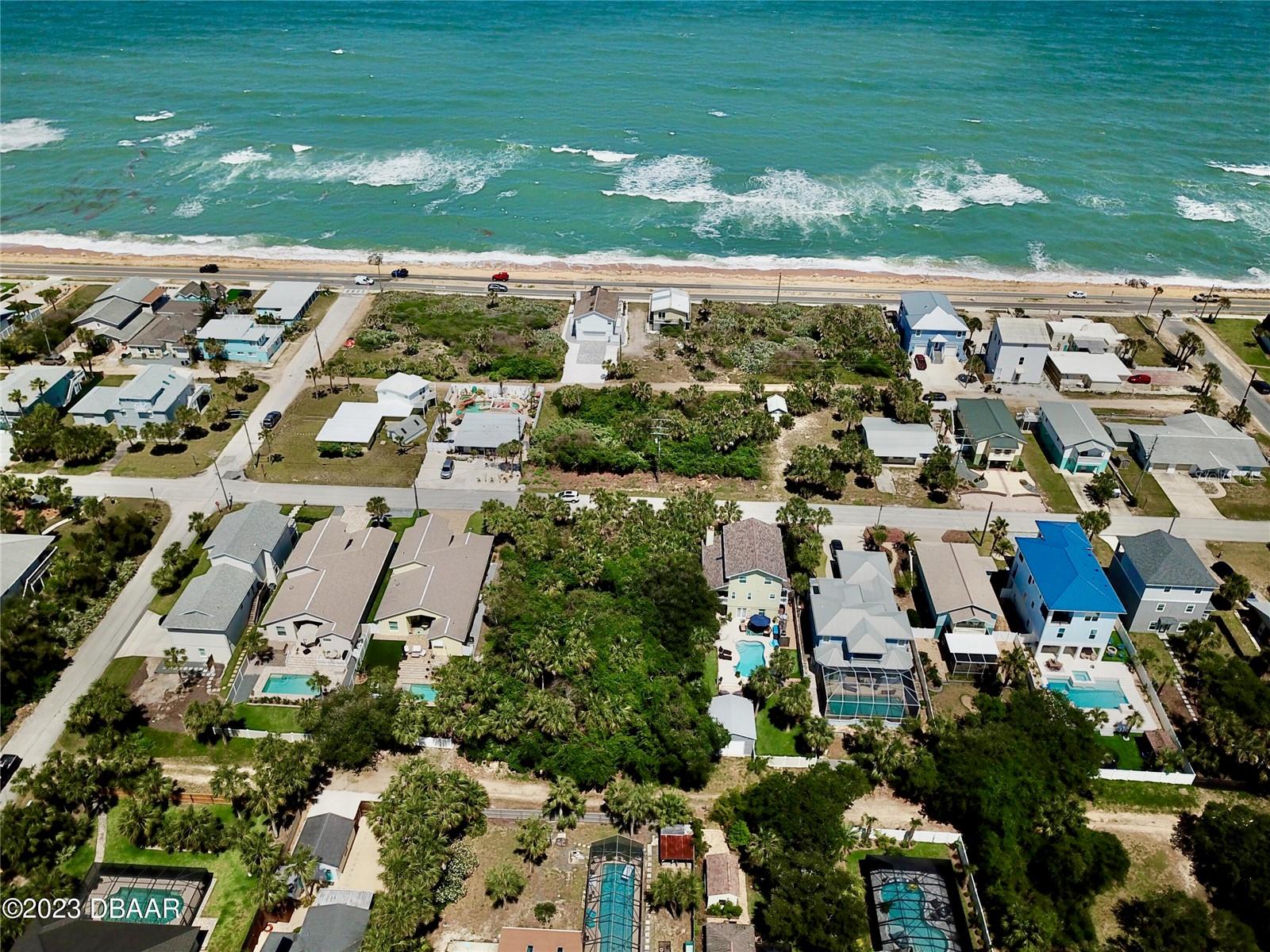 Incredible opportunity to build your dream home on a HIGH AND DRY lot on the coveted south side of Flagler Beach on Central Ave where you can build up to 3-stories high and get sweeping views of the beach and ocean! With city street in front and public alley behind, you can do any number of building plans with a lot like this. The owner has home plans that he would be happy to discuss with a qualified buyer. City water and city sewer available in this location. Only a few minute golf cart of bicycle ride to downtown Flagler Beach and all of the best beach restaurants in the area! Don't pass this up!