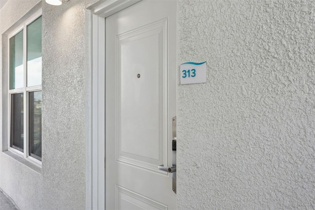 Photo of 11500 Gulf Boulevard #313, Treasure Island, FL 33706 (MLS # TB8449033)