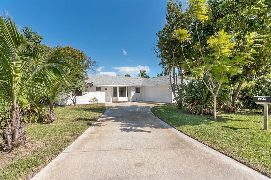 From the moment you step in the door you feel like THIS IS THE ONE! It's a real WOW house! Beautiful 4/2 nicely remodeled and move in ready for you and your family. Fourth Bedroom could easily be an office, too. Modern open concept with gorgeous new kitchen dining room combo w/ quartz counter tops and Stainless Steel Appliances. New earth-tone laminate flooring throughout the main areas with carpet in the bedrooms. New ceiling fans and light fixtures, along with new interior paint makes this home sparkle. Spacious living room with beams and vaulted ceilings overlooking a large screened in patio area makes for a true open concept. Master bedroom w/ beautifully tiled shower also has an exit door to the side yard. This split plan layout provides additional privacy for every member of the household. Guest bath in hallway is newly renovated with tub, cabinetry and quartz. The N side of this home has 2 bedrooms and office space or 3 bedrooms if needed as each room has it's own closet. The office overlooks the back patio area for wonderful indoor outdoor views. The roof is approx 5 years old. The yard is incredibly landscaped with soaring palms and a variety of plants and shrubs of every kind. You will love this very private setting w/ fenced yard and surprising views of the ICW. With a little gardening input it will be anamazing Florida paradise. Come see before it's gone. ;Water: City