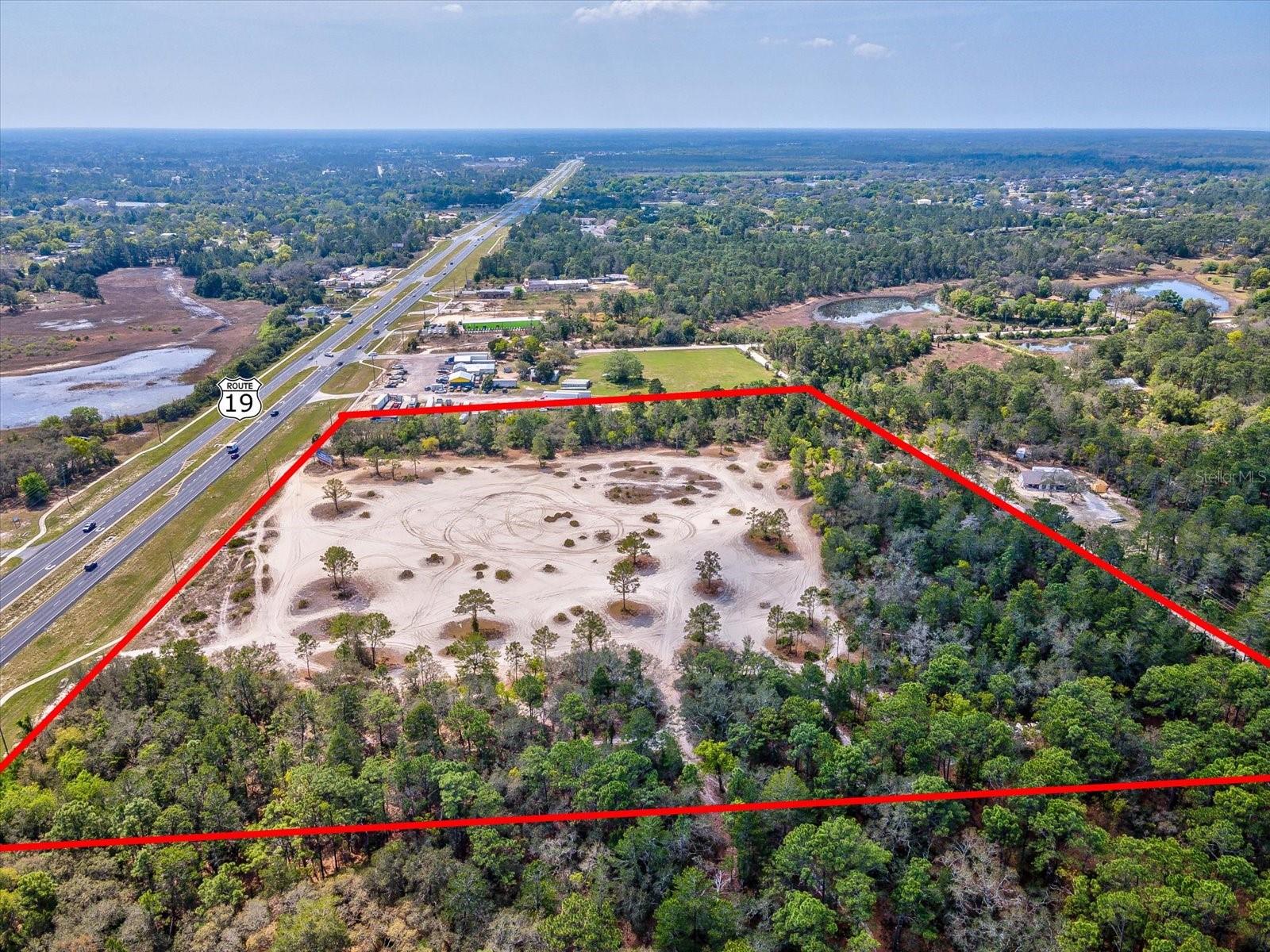 15.7 Acres COMMERCIAL WAY