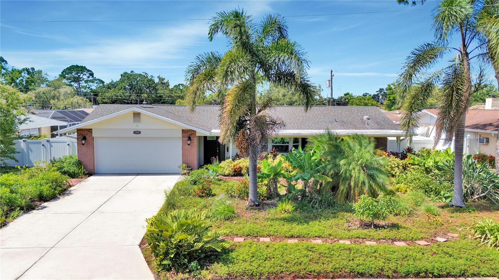 Welcome to Barcley Estates, described by residents as a "treasured secret" with friendly neighbours and a strong sense of community. This meticulously renovated and maintained 2-bedroom, 2-bathroom, 1,619 square foot home blends modern sophistication with hurricane-ready resilience, offering a versatile layout that can easily be converted into a 3-bedroom home by utilizing the formal dining room as a third bedroom.
Built with quality and upgraded extensively between 2018 and 2025, this home is move-in ready and features Miami-Dade hurricane impact windows (2020) and garage door (2021), a surge protector was added on the A/C unit in 2023, all providing a piece of mind! Speaking of that, the home had zero water intrusion during Hurricane Helene or Milton.
Step inside to discover a bright, open floor plan bathed in natural light. The heart of the home is the gourmet kitchen, featuring wood cabinets, quartz countertops, stainless steel appliances (2018), brand new Bosh dishwasher (2025), and a breakfast bar along with an kitchen dining area.
The primary suite, redesigned in 2019, is a luxurious retreat featuring a large bedroom, generous walk-in closet and a dedicated laundry closet located in the bathroom for ultimate convenience. The primary bathroom offers double sink vanity with a granite countertop, framed mirrors, three elegant sconces, and a stunning walk-in shower with Italian tile and a frameless glass door.
The second bedroom and bathroom provide ample comfort, perfect for guests or additional family members.
The front and backyard of the property were beautifully transformed in 2020 with professional landscaping, featuring lush greenery and a vibrant tropical flair. Highlights include a dwarf lemon, banana and mango trees, creating a serene, low-maintenance oasis perfect for enjoying Florida's outdoor lifestyle. An updated irrigation control system (2025) ensures effortless upkeep of these inviting spaces.
Roof, water heater, A/C and appliances are all 2018. Property also features new gutters (2020) and a new programmable thermostat (2023) .
Nearby attractions include world-class beaches, boating, fishing, golfing and professional sports venues. ( Tampa Bay Rays, Buccaneers and Lightning).
The area is also close to cultural landmarks like the Salvador Dali Museum, Tropicana Field, and the Vinoy Park, as well outdoor spaces like Weedon Island Preserve and Sawgrass Lake Park.
Call today to schedule your private showing!