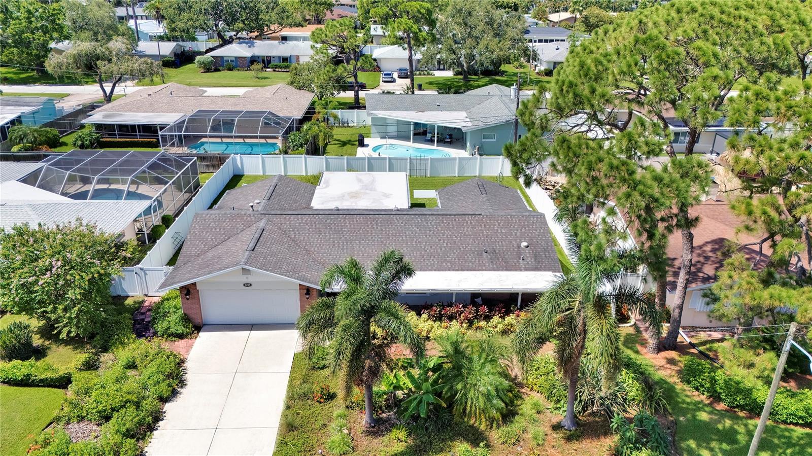 Welcome to Barcley Estates, described by residents as a "treasured secret" with friendly neighbours and a strong sense of community. This meticulously renovated and maintained 2-bedroom, 2-bathroom, 1,619 square foot home blends modern sophistication with hurricane-ready resilience, offering a versatile layout that can easily be converted into a 3-bedroom home by utilizing the formal dining room as a third bedroom.
Built with quality and upgraded extensively between 2018 and 2025, this home is move-in ready and features Miami-Dade hurricane impact windows (2020) and garage door (2021), a surge protector was added on the A/C unit in 2023, all providing a piece of mind! Speaking of that, the home had zero water intrusion during Hurricane Helene or Milton.
Step inside to discover a bright, open floor plan bathed in natural light. The heart of the home is the gourmet kitchen, featuring wood cabinets, quartz countertops, stainless steel appliances (2018), brand new Bosh dishwasher (2025), and a breakfast bar along with an kitchen dining area.
The primary suite, redesigned in 2019, is a luxurious retreat featuring a large bedroom, generous walk-in closet and a dedicated laundry closet located in the bathroom for ultimate convenience. The primary bathroom offers double sink vanity with a granite countertop, framed mirrors, three elegant sconces, and a stunning walk-in shower with Italian tile and a frameless glass door.
The second bedroom and bathroom provide ample comfort, perfect for guests or additional family members.
The front and backyard of the property were beautifully transformed in 2020 with professional landscaping, featuring lush greenery and a vibrant tropical flair. Highlights include a dwarf lemon, banana and mango trees, creating a serene, low-maintenance oasis perfect for enjoying Florida's outdoor lifestyle. An updated irrigation control system (2025) ensures effortless upkeep of these inviting spaces.
Roof, water heater, A/C and appliances are all 2018. Property also features new gutters (2020) and a new programmable thermostat (2023) .
Nearby attractions include world-class beaches, boating, fishing, golfing and professional sports venues. ( Tampa Bay Rays, Buccaneers and Lightning).
The area is also close to cultural landmarks like the Salvador Dali Museum, Tropicana Field, and the Vinoy Park, as well outdoor spaces like Weedon Island Preserve and Sawgrass Lake Park.
Call today to schedule your private showing!