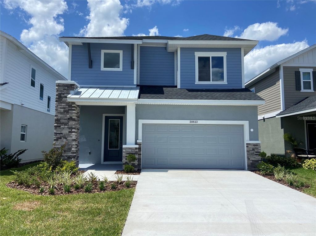 Photo of 28613 Cozy Creek Drive, Wesley Chapel, FL 33543 (MLS # TB8471726)