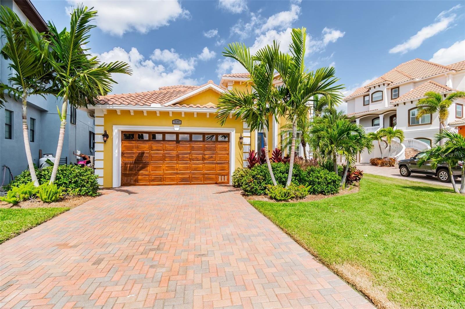 Incredible Waterfront 4-Bed, 3-Bath Pool Home in Apollo Beach!
Welcome to your Florida paradise in the private, gated Treviso community of Apollo Beach. This stunning waterfront residence is designed for the ultimate coastal lifestyle. From the moment you step inside, you'll be greeted by sweeping views of your custom pool, relaxing hot tub, and private boat dock — all perfectly set against a tranquil deep saltwater canal with direct access to Tampa Bay and the Gulf of Mexico.
The spacious open-concept first floor offers one of two oversized great rooms, a bright dining area, a well-appointed kitchen, a convenient utility room, a guest bedroom and bath, plus a luxurious first-floor master suite. The kitchen is a chef’s delight, featuring solid wood birch cabinetry with 42-inch uppers, stainless-steel appliances, a walk-in pantry, glass tile backsplash, and a granite peninsula breakfast bar that flows effortlessly into the expansive great room, complete with a custom wall-mounted electric fireplace — ideal for entertaining.
The master bedroom is a true retreat with direct access to the pool and lanai, easily accommodating large furniture with room for a private sitting area. The en-suite bath pampers with a walk-in glass shower, soaking tub, double vanity, and a spacious walk-in closet. Upstairs, you’ll find the second oversized great room that opens to a balcony perfectly positioned for breathtaking sunsets over the pool, spa, and canal. Two additional large bedrooms share a stylish Jack and Jill bathroom, offering ample space for family or guests.
Step outside to a generous lanai equipped with outdoor speakers and a wall-mounted TV — perfect for enjoying your favorite games or shows while lounging poolside. For boating enthusiasts, this home features a 9,000 lb boat lift on a deep canal that provides seamless, unobstructed access to open waters. Whether you’re seeking a serene year-round residence or a seasonal escape to enjoy Florida’s sunshine and water adventures, this incredible home delivers the lifestyle you’ve been dreaming of. Schedule your private showing today and make it yours!