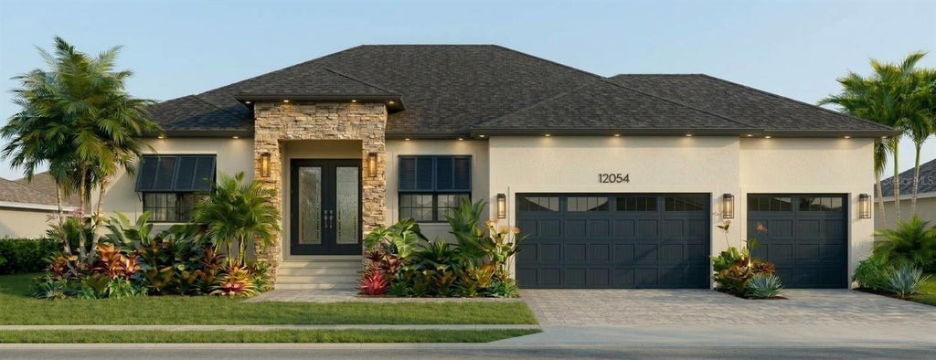 Photo of 12054 Chamberlain Boulevard, Port Charlotte, FL 33953 (MLS # W7890382)