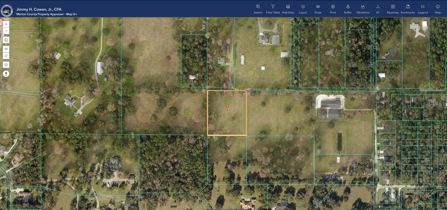 Discover this beautiful 2.56-acre lot located in the charming Sabal Park neighborhood of Ocala. Surrounded by nature and set in an agricultural area where horses take center stage, this property offers the perfect blend of country living and urban convenience. Just 15 minutes from downtown Ocala via Highway 441, you’ll enjoy easy access to schools, hospitals, and shopping. The ideal place to build your dream home and embrace the peaceful, equestrian lifestyle this area is known for.