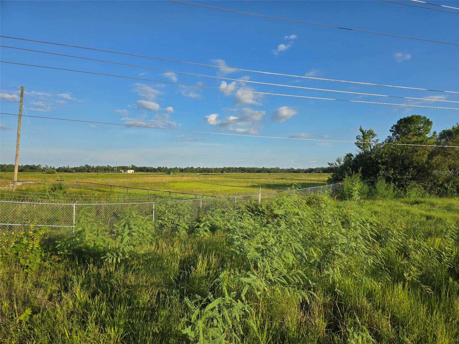 Discover an excellent investment opportunity with this vacant parcel currently zoned A-2 Agricultural. Situated in a growing area surrounded by residential development, this land offers tremendous long-term potential for buyers seeking to diversify their portfolio or complete a 1031 exchange. In the vicinity to a newly constructed convenience store and commercial business center, as well as an established neighborhood of homes, underscoring the area’s ongoing growth and demand. While the parcel does not currently have direct road access, its location adjacent to active development makes it a strategic buy-and-hold opportunity as surrounding infrastructure continues to expand. This is a forward-looking investment with the potential to benefit as the area continues to attract residential and commercial growth. Whether you’re considering agricultural use today or banking land for future development, this parcel provides a smart opportunity to own in a high-growth corridor. Affordable entry point with strong appreciation potential as surrounding development continues. Buyer resposible for due diligence.