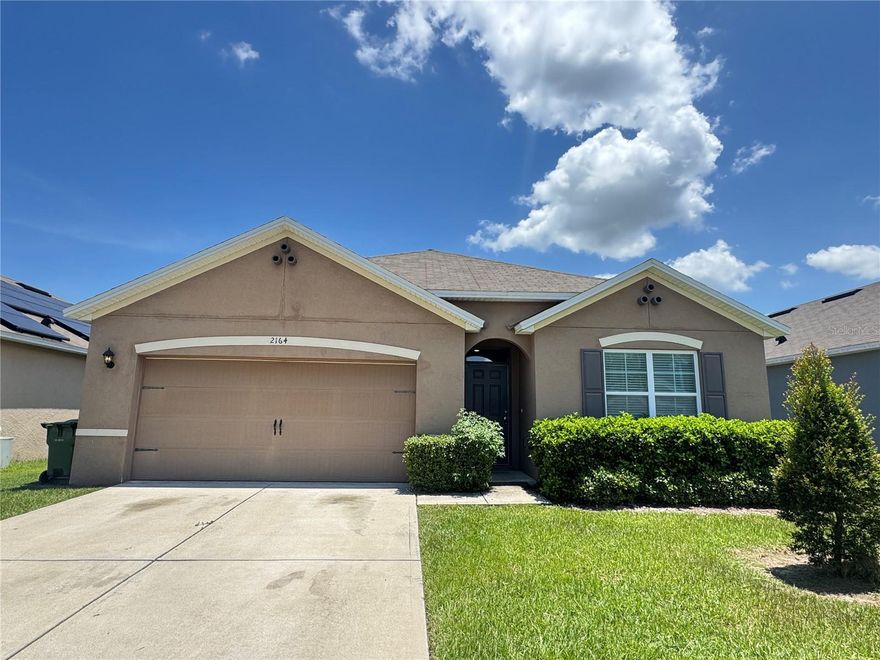 Welcome Home! Glide into your beautifully maintained 4-bedroom, 2-bathroom home in the peaceful Buckeye Ridge community of Winter Haven, Florida. Built in 2018, this 1,851-square-foot home offers a spacious open-concept layout with a stylish kitchen featuring dark brown cabinetry, a central island with an integrated sink, and seamless flow into the living and dining areas. Add your favorite stools to the edge of the island to use as a breakfast bar! Tile flooring in wet areas and plush carpeting in the main living spaces add both durability and comfort, while the neutral color palette makes it easy to add your personal touch. Sliding glass doors open to the backyard, filling the home with natural light and creating the perfect space for relaxation or entertaining.

Situated in Buckeye Ridge, this home provides a quiet retreat while keeping you close to everything Winter Haven has. With easy access to the city’s famous chain of lakes, outdoor recreation, shopping, dining, and entertainment are all within reach. Pet-friendly and move-in ready, this home won’t last long—schedule your showing today!

$500 off for the first month of rent!!!!