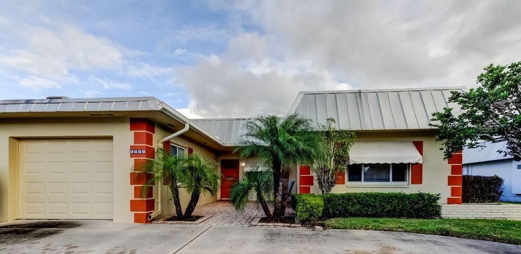 Photo of 6565 Green Valley Dr, Seminole, FL 33777 (MLS # TB8455242)