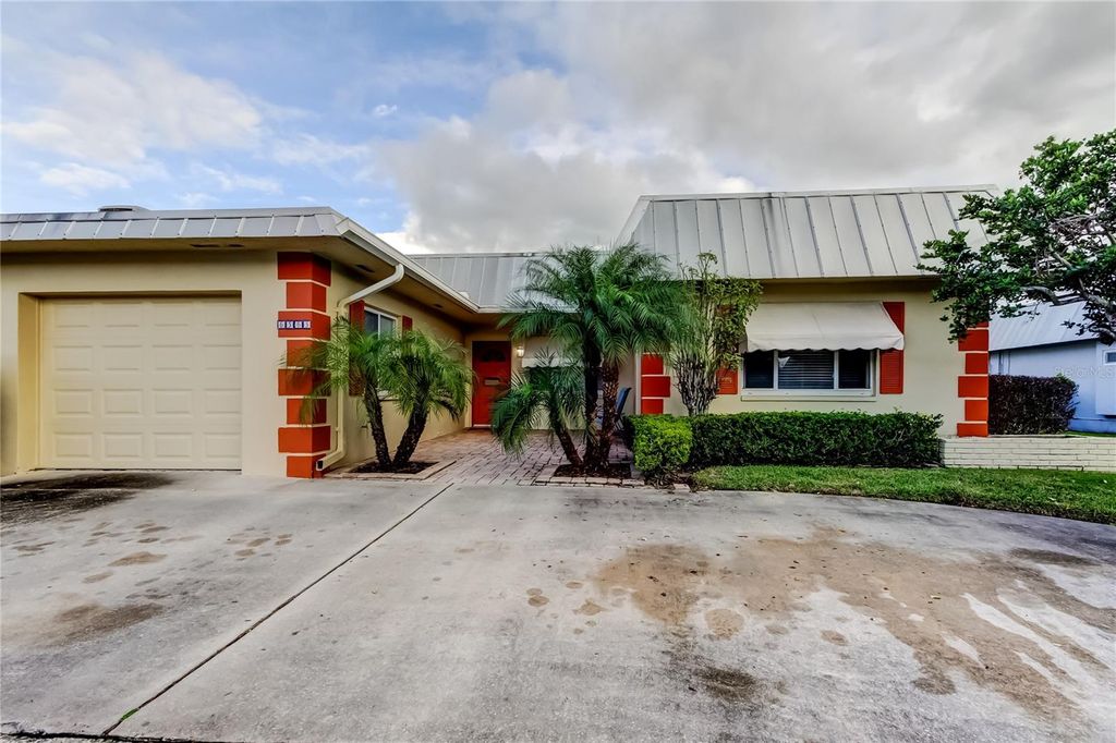 Photo of 6566 Green Valley Drive #6565, Seminole, FL 33777 (MLS # TB8455242)