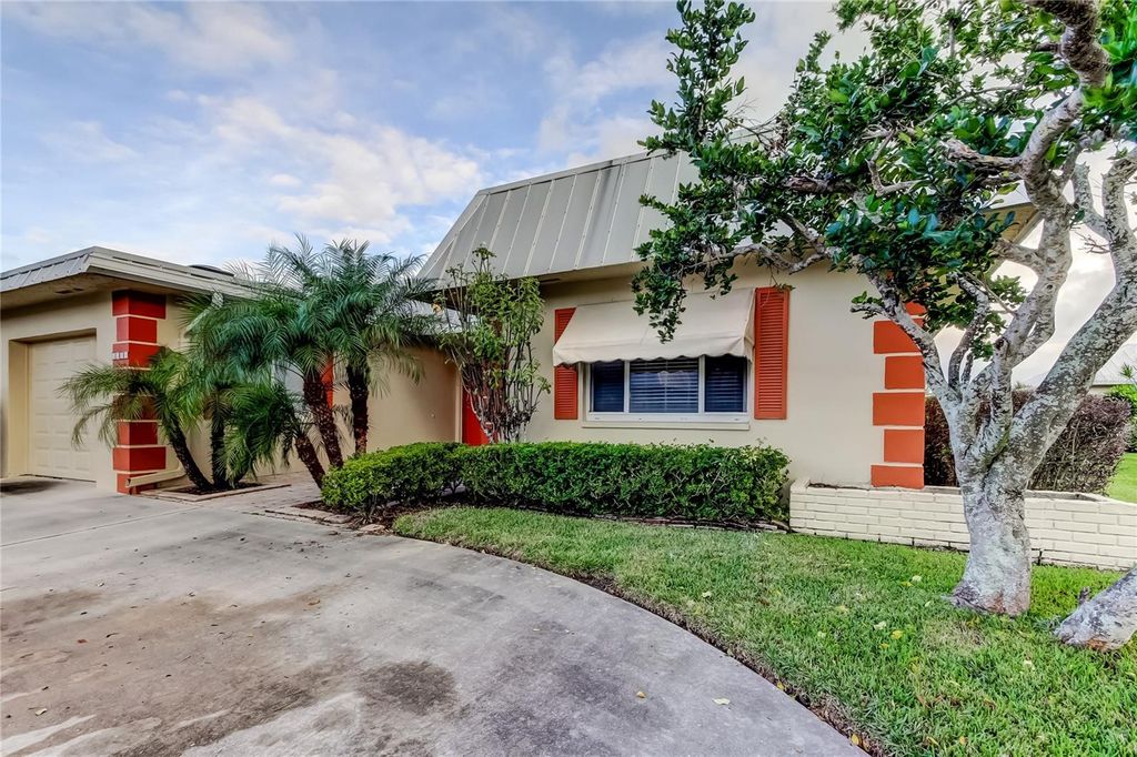 Photo of 6566 Green Valley Drive #6565, Seminole, FL 33777 (MLS # TB8455242)