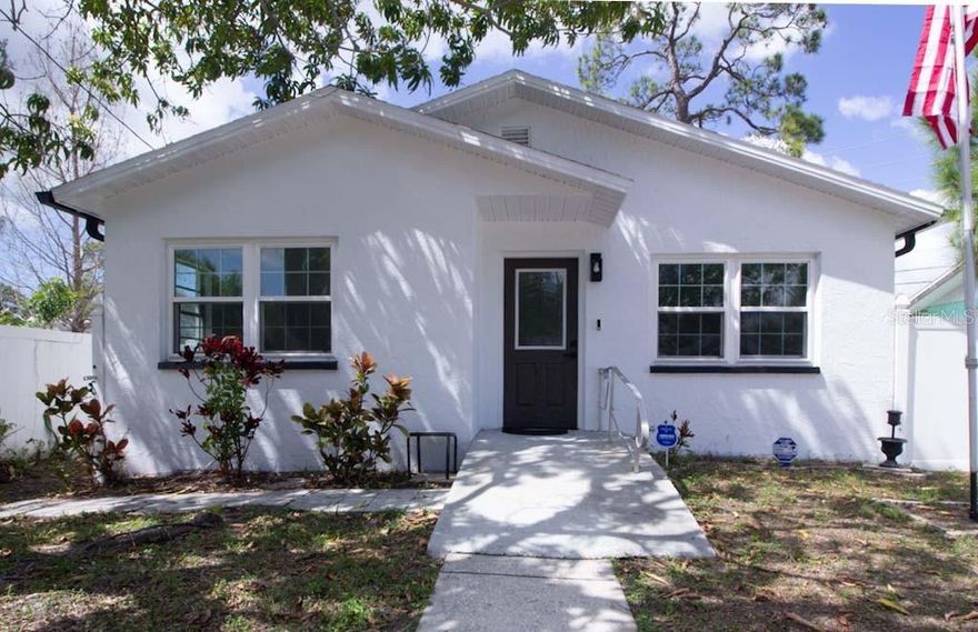 THE HOUSE IS DONE!!! This fully, meticulously renovated home needs no further additions.  Featuring a new front door. Modern kitchen with stone counters, stainless steel appliances, breakfast bar, and upgraded fixtures. Fresh plaster & paint on all walls and ceilings. New ceiling fans with remotes, and all-new interior doors create a contemporary feel. The main bathroom boasts frameless shower glass doors, stone counter vanity and updated faucet. Luxury vinyl flooring runs throughout the house, with ceramic tile floor in the bathroom. The garage located in the rear is newly finished with new plaster & paint, epoxy floors, new garage door with hurricane supports and new Chamberlain remote opener. A spacious driveway with double gates offers privacy and plenty of parking, while the fenced backyard and side plus a chain link fence in front ensure security. New electrical panel. New rain-gutters & downspouts. IT’S ALL DONE AND JUST WAITING FOR YOU. CALL TODAY FOR A PRIVATE SHOWING.