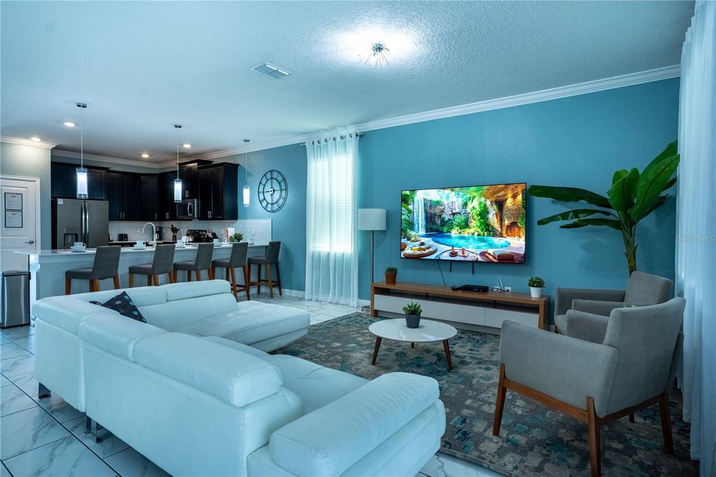 Photo of 760 Drop Shot Drive, Davenport, FL 33896 (MLS # O6402066)