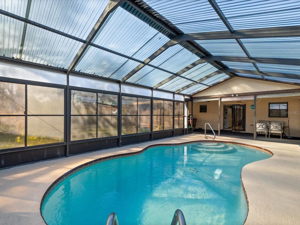 Photo of 3250 Ambassador Avenue, Spring Hill, FL 34609 (MLS # W7881489)