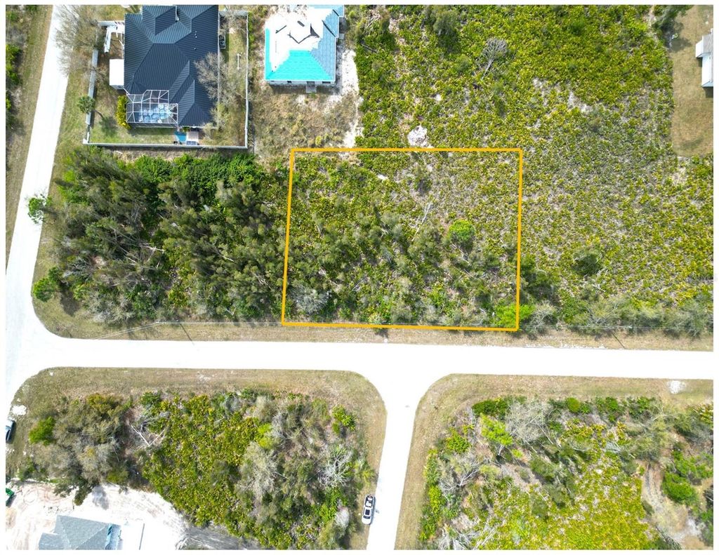 Photo of 13591 Frost Lane, Port Charlotte, FL 33981 (MLS # D6142668)