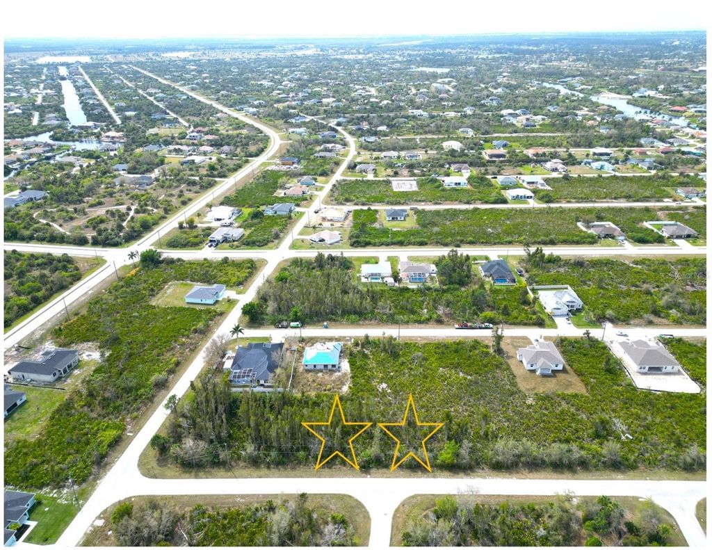 Photo of 13591 Frost Lane, Port Charlotte, FL 33981 (MLS # D6142668)