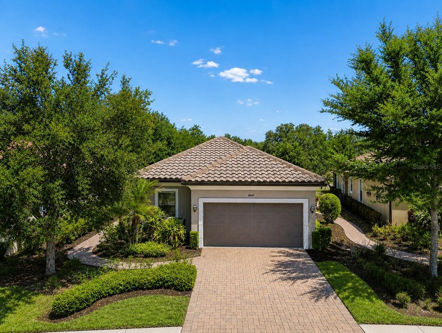 Welcome to this beautifully maintained home in the highly desirable, GATED resort-style community of
Esplanade of Tampa. Built by Taylor Morrison, this home offers a functional open layout, LOW-
MAINTENANCE LIVING, and one of the most peaceful and unique views in the neighborhood. Situated on a
quiet street with a STUNNING BACKDROP OF MATURE OAK TREES AND POND VIEWS, this home
offers a setting that feels private, relaxing, and hard to find in newer communities.
From the moment you arrive, the brick paver driveway, TILE ROOF, manicured landscaping, and well-kept
exterior immediately showcase the PRIDE OF OWNERSHIP. Inside, the home is in PRISTINE
CONDITION with added details like TRAY CEILINGS and TILE THROUGHOUT, and has been exceptionally
maintained, creating a true MOVE-IN READY OPPORTUNITY.
The thoughtfully designed floor plan features 3 BEDROOMS, 2 FULL BATHROOMS, a FLEXIBLE DEN/
OFFICE SPACE, and a 2-CAR GARAGE. The open den adds versatility without closing off the space, making
it ideal for a home office, reading area, or additional sitting space while still keeping the home feeling bright
and connected.
The kitchen, dining, and living areas flow seamlessly together, creating an easy layout for both everyday living
and entertaining. Large sliding glass doors across the back of the home help bring in natural light while
highlighting the beautiful outdoor scenery with THE OVERSIZED EXTENDED LANAI. The kitchen offers
generous cabinetry, ample counter space, NATURAL GAS range, stainless steel appliances, and a layout that
stays connected to the main living areas. The laundry room has CUSTOM UPPER AND LOWER
CABINETRY, along with a convenient UTILITY SINK.
The PRIMARY SUITE is privately positioned and overlooks the peaceful POND AND CONSERVATION
VIEWS, creating a relaxing retreat. The bathroom features dual vanities, a walk-in shower, and a SPACIOUS
WALK-IN CLOSET. Secondary bedrooms are thoughtfully positioned to provide both privacy and
functionality, with one offering DIRECT ACCESS TO THE ADJACENT BATHROOM, creating a
comfortable en-suite-style setup.
One of the standout features of this home is the LARGE EXTENDED LANAI WITH PANORAMIC SCREEN VIEWS, offering plenty of room for outdoor seating, dining, and enjoying the BEST VIEW IN THE NEIGHBORHOOD. The combination of the
pond, RARE mature oak trees, and extended outdoor living space creates an atmosphere that truly SETS THIS
PROPERTY APART FROM MANY OTHERS IN THE COMMUNITY.
Esplanade of Tampa offers RESORT-STYLE AMENITIES including a clubhouse, fitness center, resort-style
pool with cabanas, pickleball courts, dog parks, fire pit, and a full calendar of social events. Conveniently
located near I-75 and I-275, Wiregrass Mall, Tampa Premium Outlets, top-rated hospitals, dining, and
entertainment, this location continues to be one of the most sought-after areas in New Tampa. The community is
NOT age-restricted and offers the added benefit of NO CDD FEES.
With PRISTINE CONDITION, PEACEFUL POND AND OAK TREE VIEWS, AN EXTENDED LANAI,
AND A HIGHLY FUNCTIONAL FLOOR PLAN, this home offers a rare combination of comfort, privacy, and
low-maintenance living in one of Tampa’s premier gated communities.