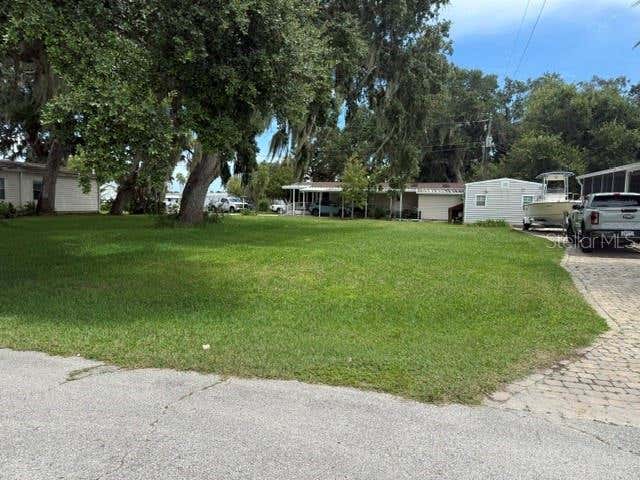 Photo of 156 Red Bass Lane, Edgewater, FL 32141 (MLS # O6430144)