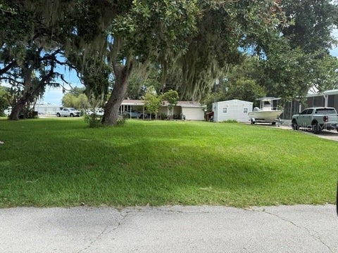 Photo of 156 Red Bass Lane, Edgewater, FL 32141 (MLS # O6430144)