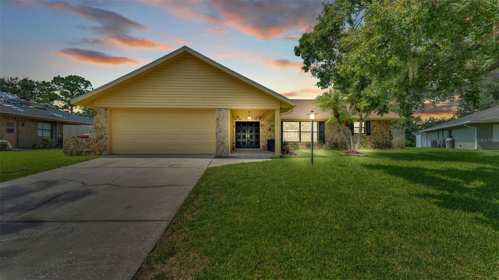 Welcome to this charming 3-bedroom, 2-bathroom pool home, where comfort and style come together to create the perfect place to call home. From the moment you step inside, you’ll be greeted by a warm and inviting atmosphere, with an open layout that makes everyday living and entertaining a breeze. The entire inside of the home was just re-painted a creamy off-white to provide a neutral canvas for you to truly make it your own. At the heart of the home is a beautifully updated kitchen, featuring granite counters, stainless steel appliances, and elegant glass-front display cabinets that add a touch of character. The breakfast bar provides the ideal spot for casual meals, morning coffee, or gathering with friends and family. The split bedroom floor plan has the primary suite just off of the living room with its own en suite bathroom, and access to the pool deck through its own set of sliding glass doors. The living spaces flow seamlessly to the outdoors through sliding glass doors leading out to the covered lanai, where you’ll find your own private retreat. A sparkling pool awaits, perfect for cooling off on warm Florida days, while the fully fenced backyard offers peace of mind and plenty of space for pets, play, or simply relaxing in the sunshine. Utilize the pass-through window located in the kitchen behind the sink to serve food directly to the lanai, placing it on an external counter. This helps create a seamless indoor/outdoor entertaining space. With two additional comfortable bedrooms and another full bath, this home is designed to fit your lifestyle—whether you’re starting out, downsizing, or anything in between. Don’t miss your chance to make this poolside retreat yours—schedule your private showing today!