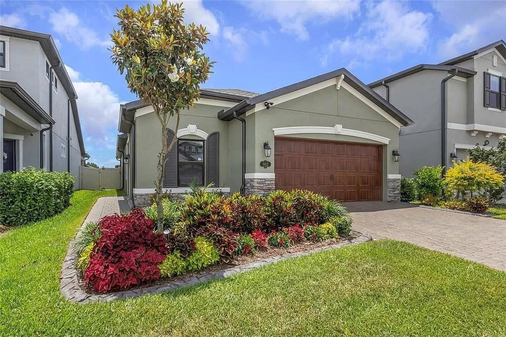 Discover modern living at 19412 Breynia Dr, a spacious 3-bedroom, 2-bathroom home offering 1,657 sq ft of living space. https://www.propertypanorama.com/instaview/stellar/TB8412225 As you enter, you'll find elegant flooring throughout and a bright, open kitchen equipped with gorgeous countertops, ample cabinetry, and a full suite of stainless steel appliances. The dining area seamlessly connects to the patio, creating an ideal space for entertaining. The nicely-sized bedrooms plenty of closet space, ensuring comfort for everyone. With a washer and dryer included, laundry day will be a breeze. Step outside to your fenced backyard, which features a private screened heated pool, complete with lighting for evening enjoyment perfect for relaxing and entertaining outdoors. This home also boasts solar panels, providing significant savings on energy costs for tenants. You'll enjoy an attached two-car garage and the fantastic amenities of The Reserve at Long Lake Ranch community, including a heated pool with lights, playground, and walking trails. Conveniently located near a variety of dining and shopping options with easy access to Hwy 41 and 54, this property is a must-see. Don't miss out on this incredible opportunity contact us today to schedule a viewing!
