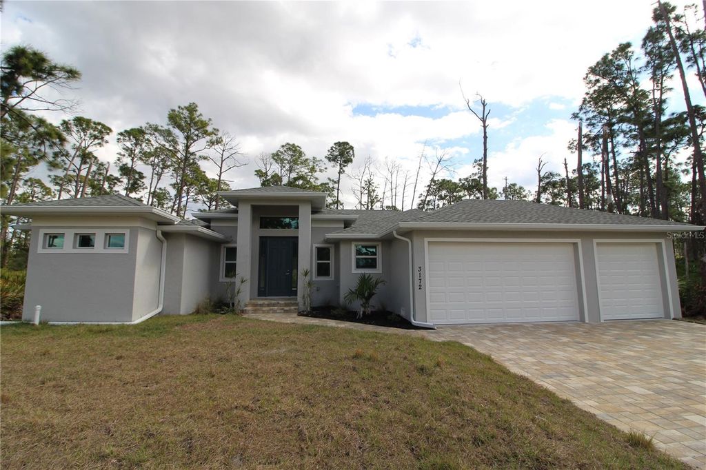 Photo of 3172 Dutton Street, Port Charlotte, FL 33948 (MLS # C7521405)