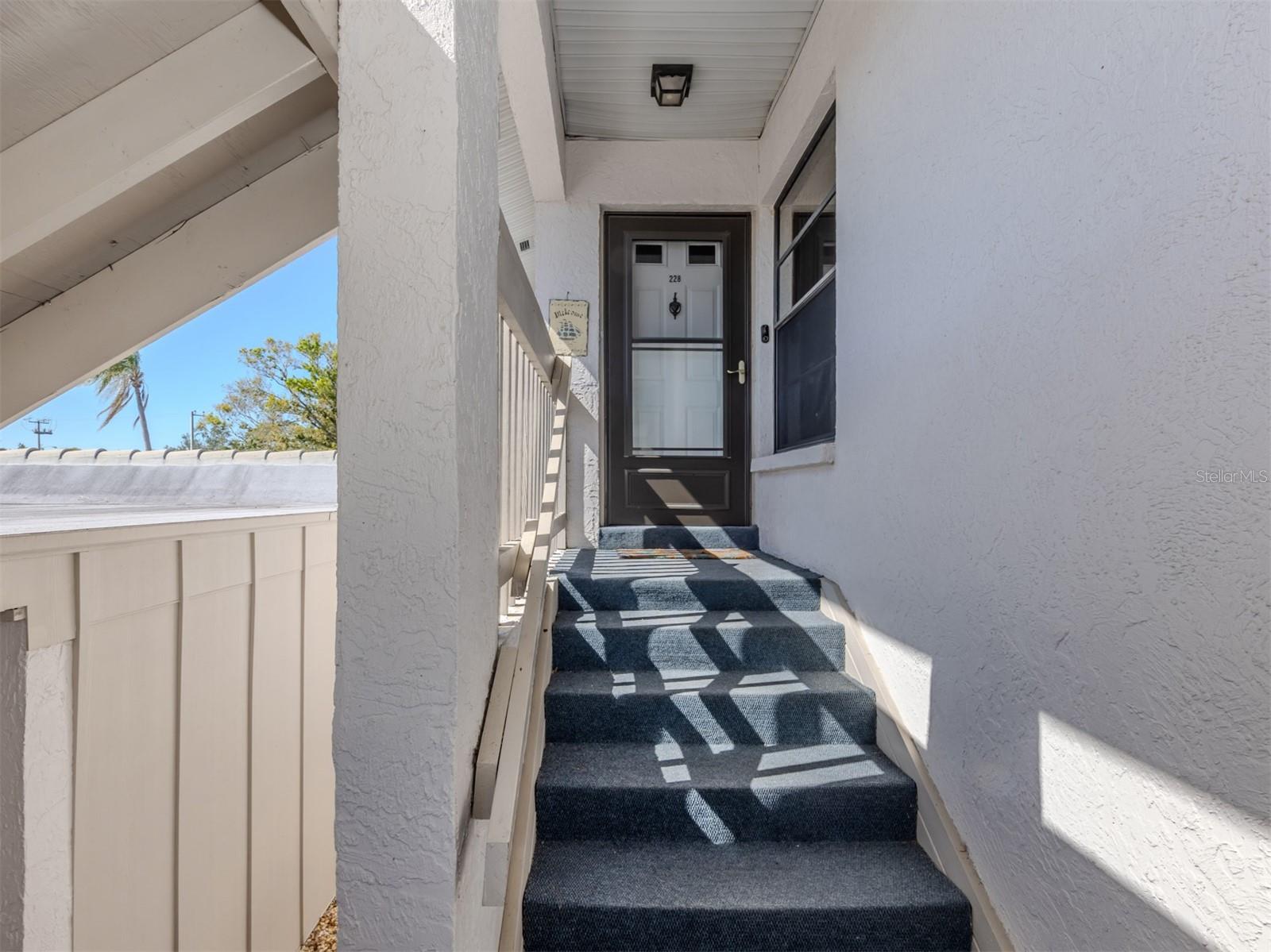 Price Improvement!
Move-in-ready, 2nd floor end unit with Private Entrance, attached covered carport and vaulted ceilings. Enjoy a remodeled kitchen with granite countertops, pantry and newer appliances. The Primary suite features a brand new shower and closets. The Furnace and A/C are also new. This unit is located in the Golf View community in beautiful Venice! This end unit provides ample natural light due to its many windows and cathedral ceilings, you will not find in any other unit. Unit 228 has been renovated top to bottom, offering LVP flooring, new carpets, along with ample storage closet AND there is no unit above you. Imagine waking up to the tranquility of lush green trees and the gentle rustling of palm trees, right from the comfort of your home. Unit 228 offers your covered parking space and a locked shed to store all your beach and personal items. There is also available parking for a second car and guests. This turnkey furnished gem ensures you can move right in and start living your dream immediately. Just 4 miles to the Gulf and 375 yards to the Capri golf course, you'll find endless opportunities for relaxation and recreation, along with the historic downtown Venice for restaurants and famous shops. The maintenance-free community with heated pool is ideal for enjoying a leisurely swim or catching up with friends and neighbors. Embrace the essence of Florida living as you unwind and soak up the glorious sunshine. Rest easy knowing this property has been meticulously maintained.