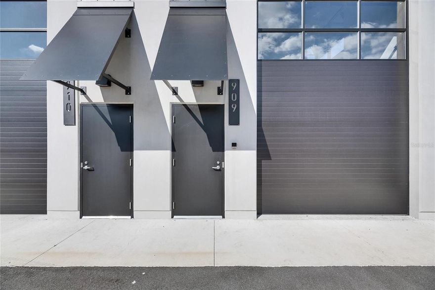 Elevate your ventures with this prime corner commercial garage condo situated within the Motor Enclave, a premier motorsports community. The Motor Enclave is the largest garage community located in Tampa. This 779 sq. ft. corner unit offers a blend of open and adaptable space, perfect for storage, workshops, office or automotive businesses. Plans for a build out included. This unit is a blank canvas that allows for free-standing structures, giving you the freedom to design your space without anchoring to the walls. Gated community with 24/7 security, ensuring the safety of your valuable assets. Easy access to major highways I-75 and I-4. With a Membership to the Motorsports club, garage owners have access to community amenities including a 1.72-mile track designed by Hermann Tilke, a 100-acre off road experience, a 2-acre skid pad, and a resort style pool. Located within the community is a 37,000 sq. ft. event center perfect for gatherings, networking, and attending public and private events. This garage condo is an exceptional opportunity to be part of an exciting motorsports community. This IS NOT a residential property. Whether you're looking to expand your automotive business or create a personal workshop, this corner unit offers the perfect blend of space and flexibility.