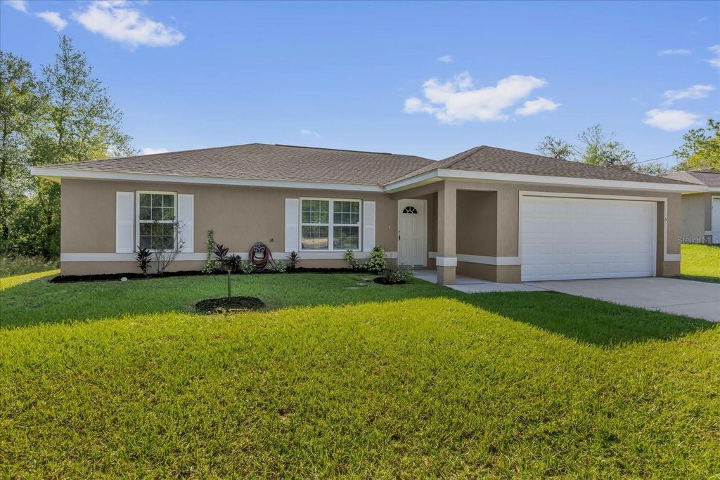 Photo of 5 Locust Loop Circle, Ocala, FL 34472 (MLS # O6354618)