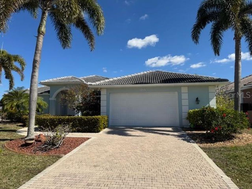 Photo of 1359 Pine Siskin Dr, Punta Gorda, FL 33950 (MLS # O6384119)